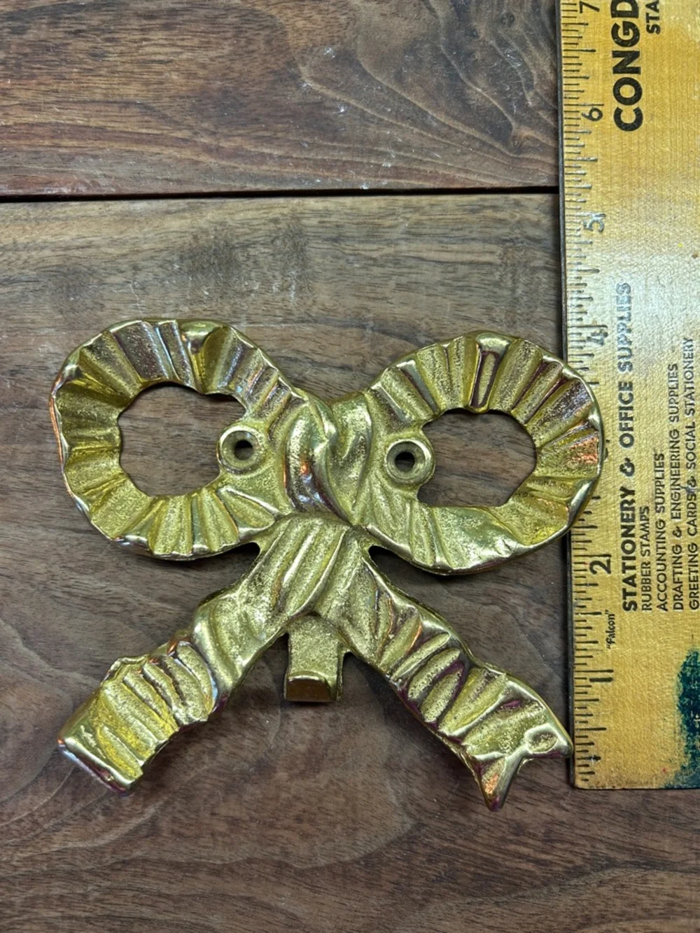 N/A brass bow